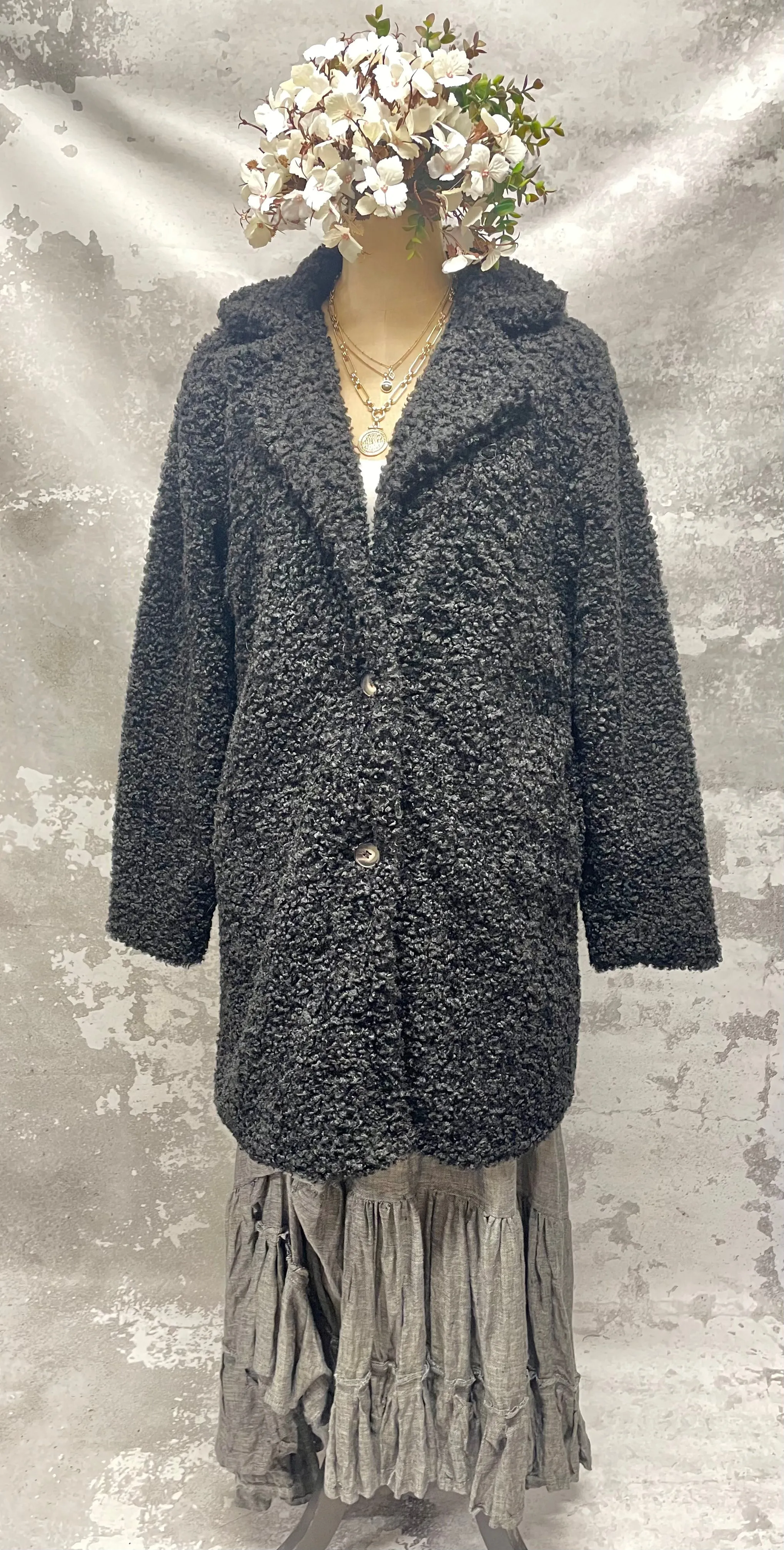 Black poodle coat