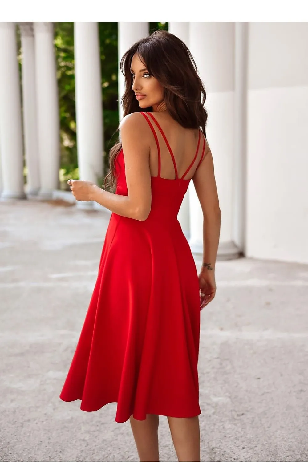 Flared bottom evening dress with a long slit