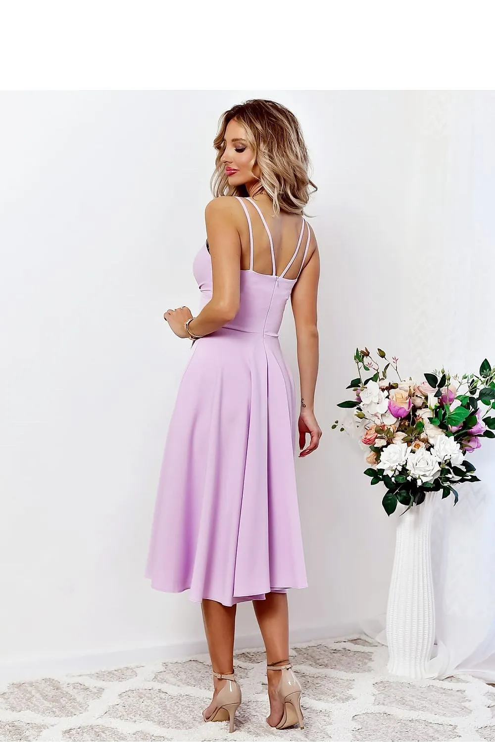 Flared bottom evening dress with a long slit
