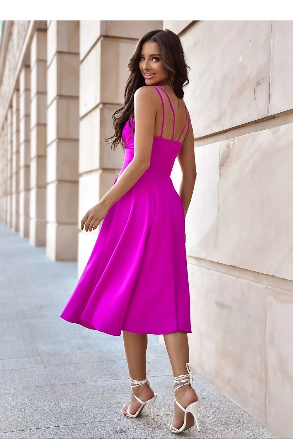 Flared bottom evening dress with a long slit
