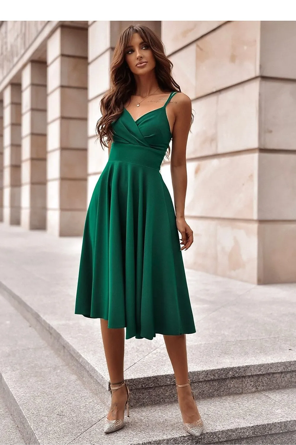 Flared bottom evening dress with a long slit