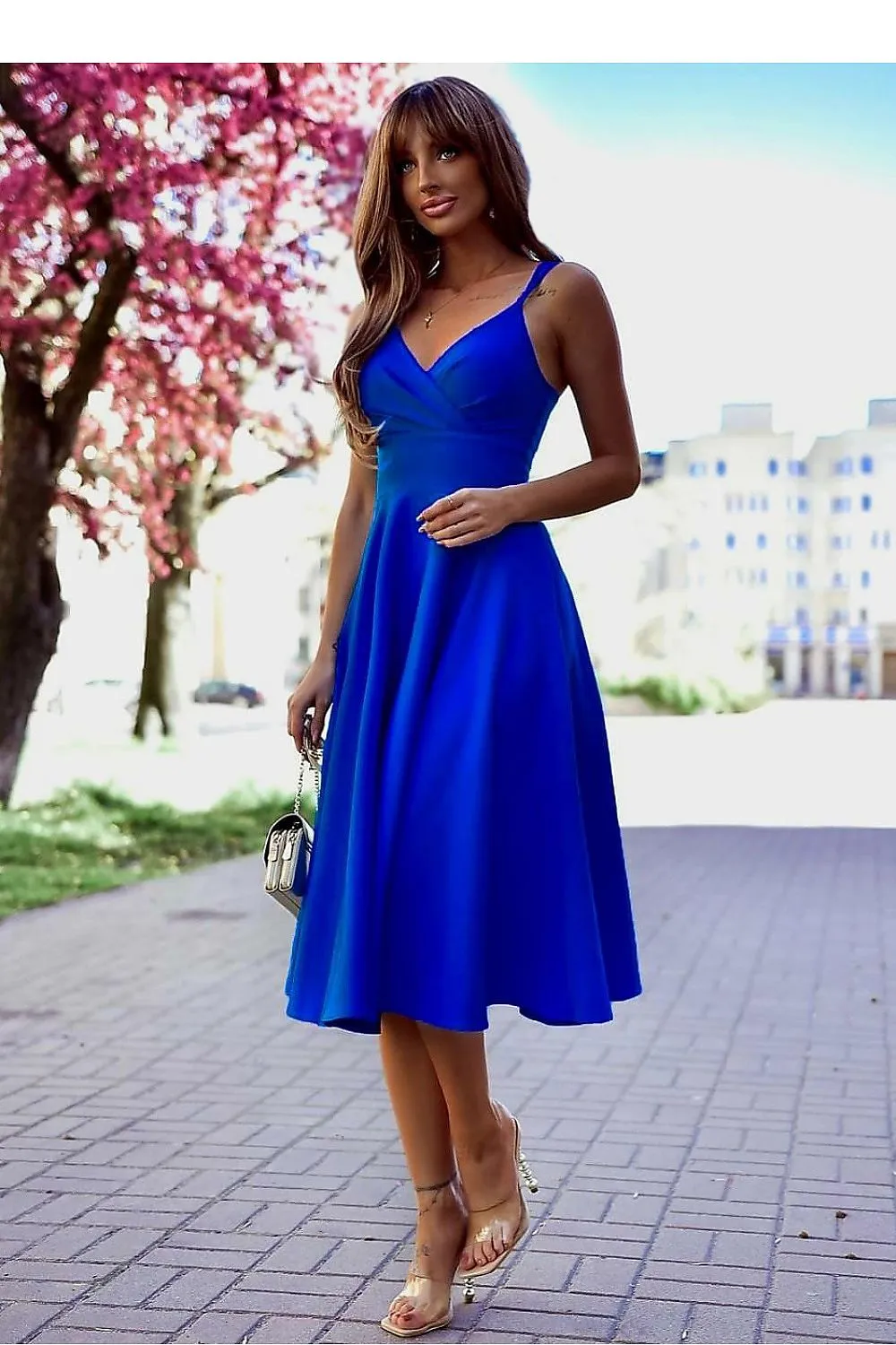 Flared bottom evening dress with a long slit
