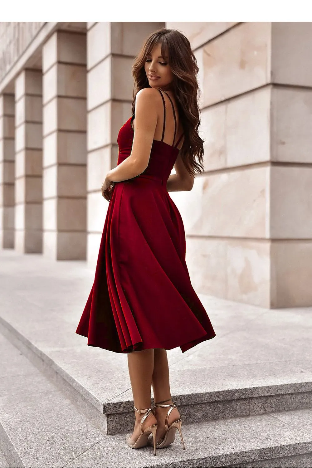 Flared bottom evening dress with a long slit