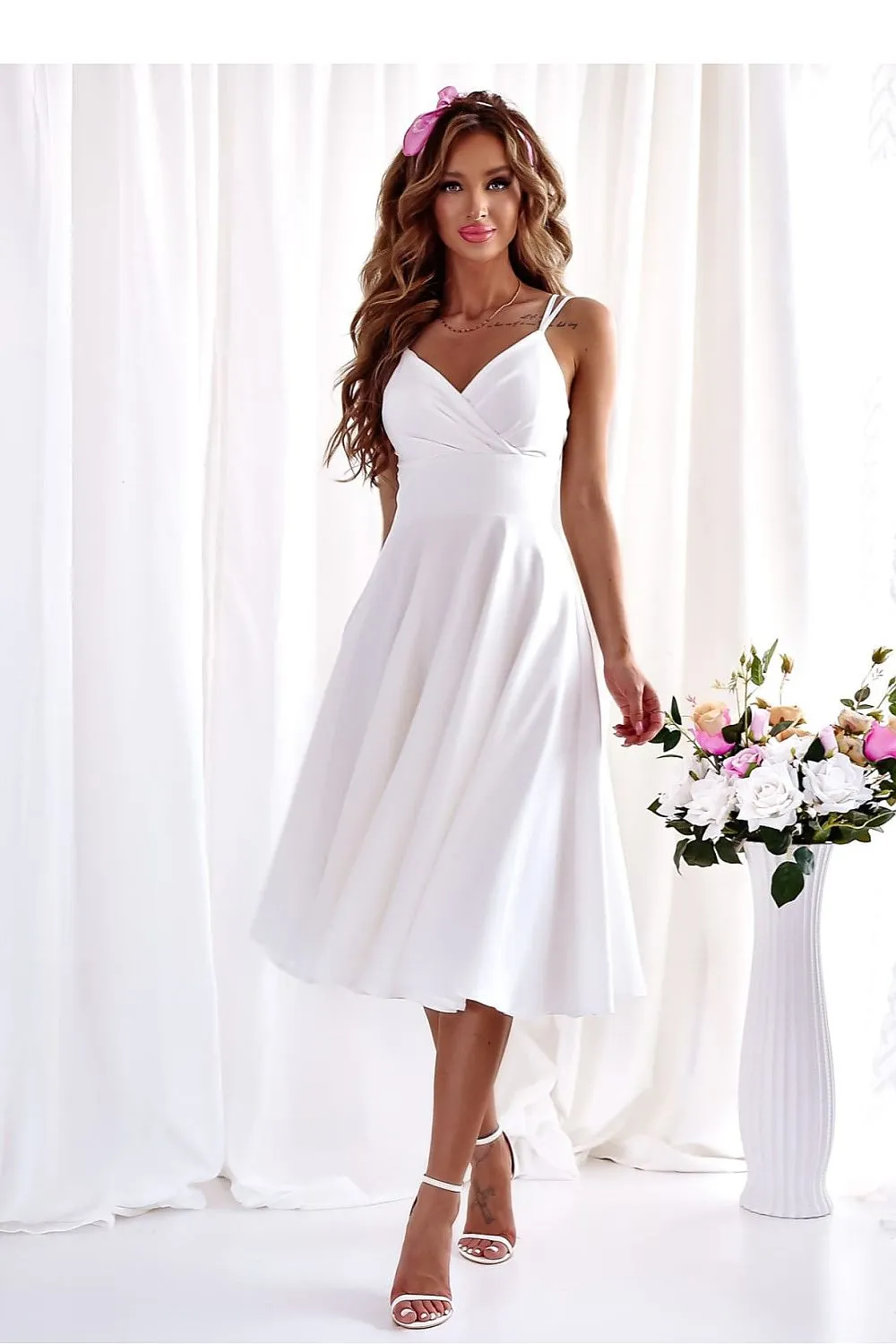 Flared bottom evening dress with a long slit