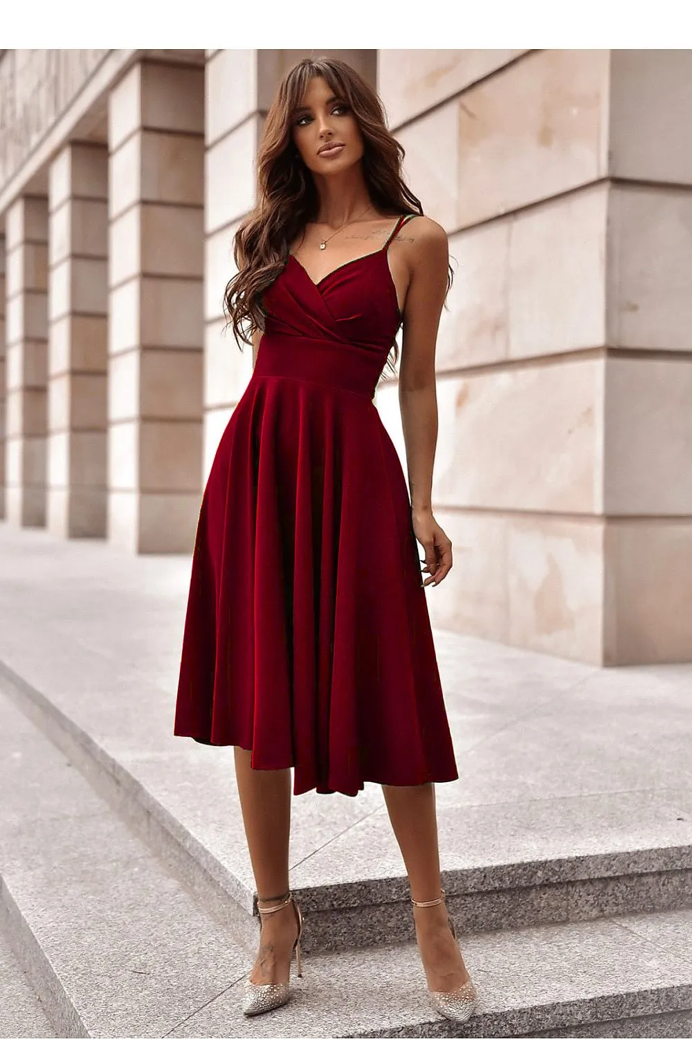 Flared bottom evening dress with a long slit