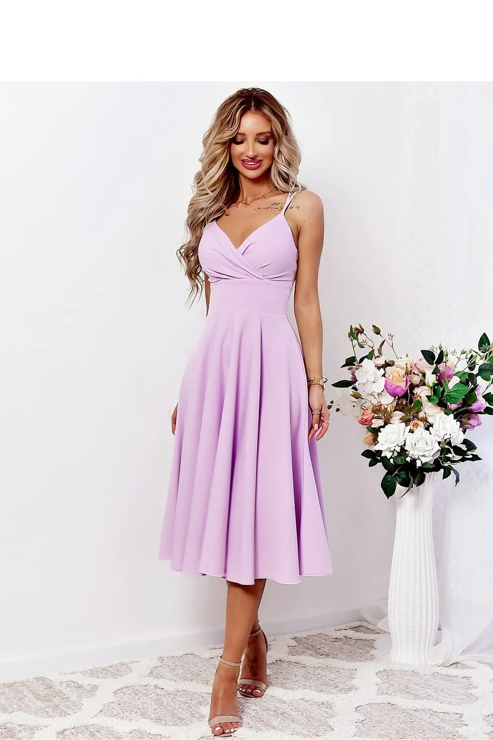 Flared bottom evening dress with a long slit