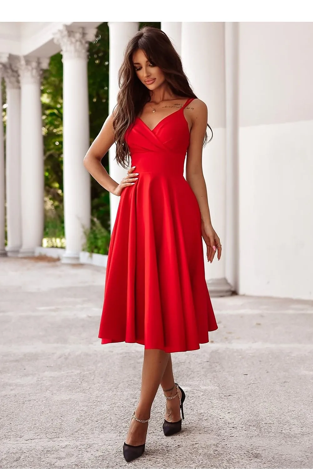 Flared bottom evening dress with a long slit
